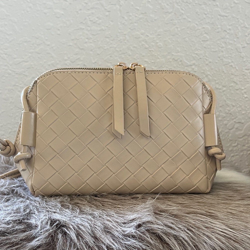 Similar to the Intrecciato Concert Pouch